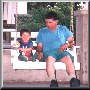 Joshua & Daddy on the front porch swing