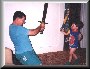 Joshua & Daddy sword fighting